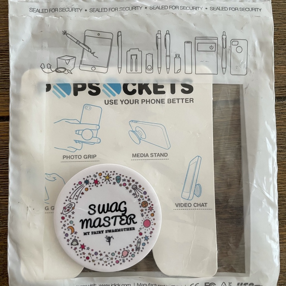 Tech gadget, doodad.Popsocket phone grip